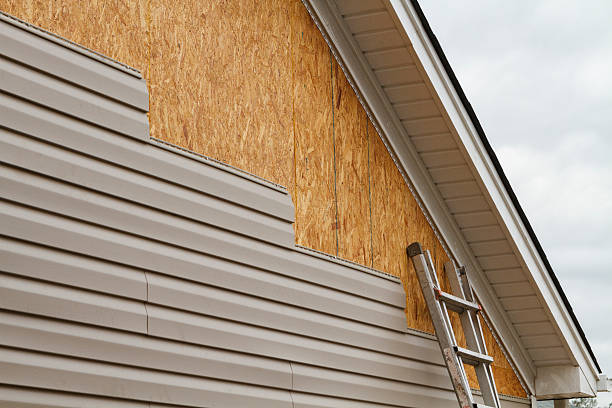 Professional Emergency Siding Repair technician working in East Earl, PA